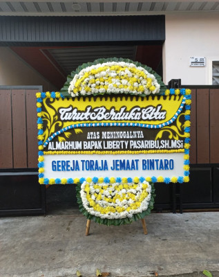 Papan Bunga Duka di Pantai Timur